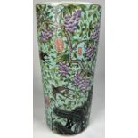 A LARGE CHINESE CERAMIC UMBRELLA STAND, painted with imagery of grapes, vine leaves and flowers