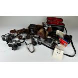 A COLLECTION OF CAMERAS, to include various makes such as Minolta, Olympus, Pentax etc. Some cased.