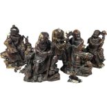 A LARGE GROUP OF FIVE CHINESE HARDSTONE FIGURES, depicting figures at worship. Numbered to