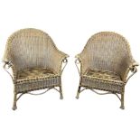 A PAIR OF LARGE ANGLO COLONIAL STYLE ARMCHAIRS (2)