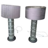A PAIR OF SILVER PAINTED LAMPS, WITH SHADES 72cm with shades