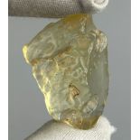 A NEOLITHIC SCRAPING TOOL IN DESERT GLASS TEKTITE, From the Tenerean Culture, tool was worked