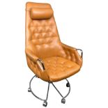 ATTRIBUTED TO BRUNO MATTHSON: A BROWN 'JETSON' LEATHER SWIVEL ARMCHAIR, with chrome arms on chrome