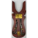 EQUESTRIAN INTEREST: RIDING BOOT PULLS, in a case.