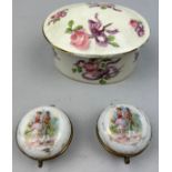 TWO PORCELAIN PILL BOXES AND A SMALL LIDDED DISH (3)