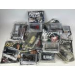 A COLLECTION OF JAMES BOND DIE CAST TOY CARS BY G FABBRI WITH MAGAZINES, along with a book of