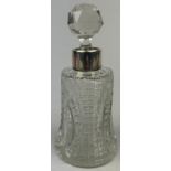 PROPERTY OF A TITLED LADY: A CRYSTAL CUT DECANTER WITH SILVER COLLAR, hallmarked silver for ' W H S'