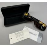 A PAIR OF VERSACE SUNGLASSES IN ORIGINAL CASE WITH TAGS AND CERTIFICATE OF AUTHENTICITY, Gold medusa