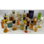 A COLLECTION OF PARTIALLY USED VINTAGE DESIGNER PERFUME BOTTLES, to include Chanel, Francesco Smalto