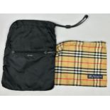 A SMALL VINTAGE PRADA BAG AND A BURBERRY'S WASHBAG (2) 38cm x 28cm 30cm x 26cm Both in good