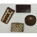 A SELECTION OF VINTAGE GUCCI PURSES AND WALLETS (4)