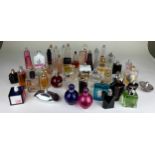 A COLLECTION OF PARTIALLY USED DESIGNER PERFUME BOTTLES, to include Lacoste, Calvin Klein and