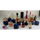 A COLLECTION OF PARTIALLY USED DESIGNER PERFUME BOTTLES, to include Dior, Lacoste and Issey
