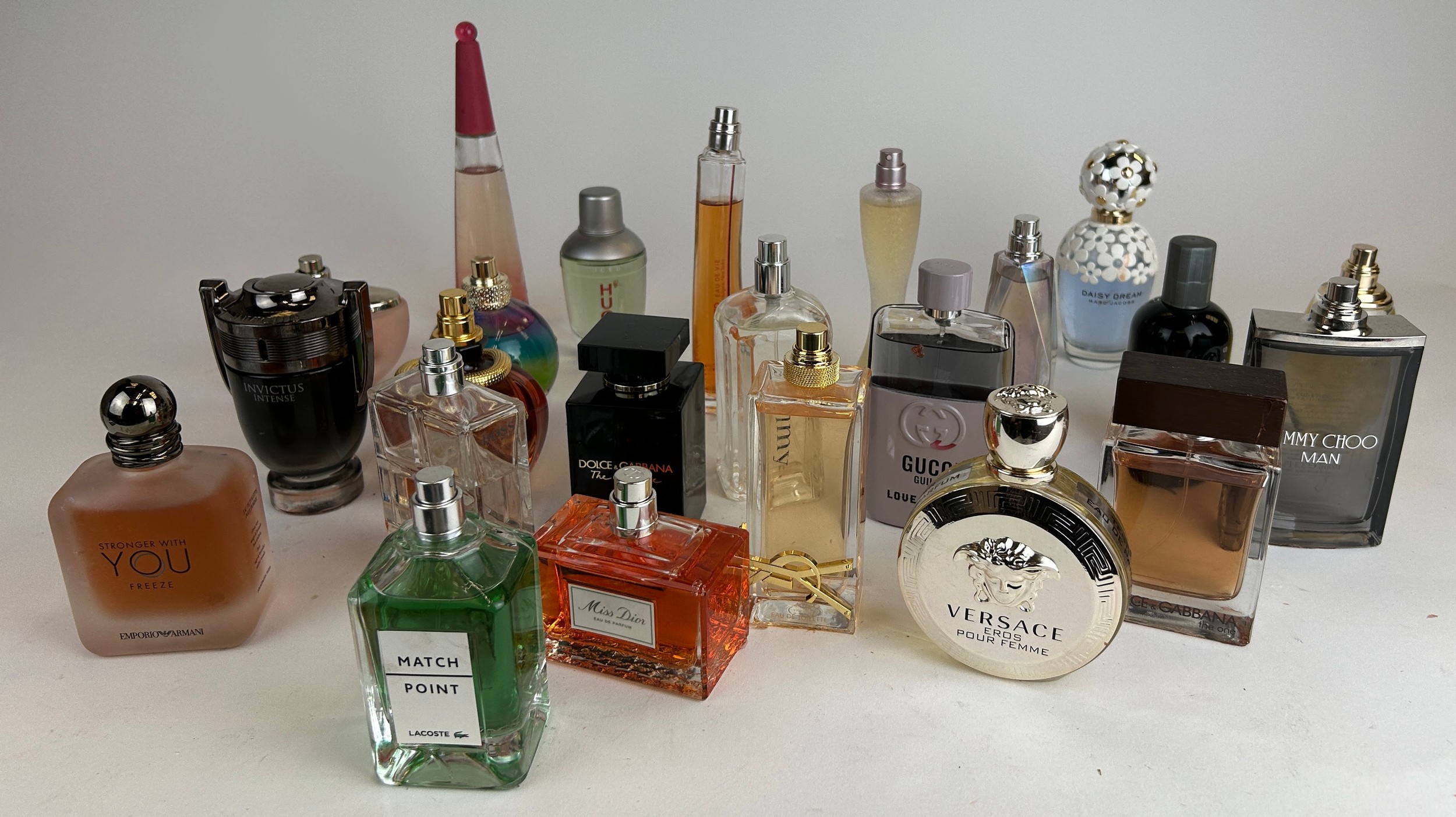 A COLLECTION OF PARTIALLY USED DESIGNER PERFUME BOTTLES, to include Christian Dior and Jimmy Choo (