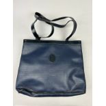 A VINTAGE YVES SAINT LAURENT TOTE BAG, royal blue with central 'YSL' emblem and blue leather