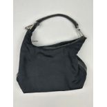 A GUCCI BLACK HANDBAG, with silver coloured hardware 30cm x 20cm Good condition. Minimal signs of