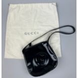 A GUCCI HANDBAG IN BLACK WITH DUSTBAG, 20cm x 20cm Exterior in very good condition. Interior is