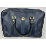A VINTAGE FENDI HANDBAG, blue strips with gold coloured metal hardware and central zipped