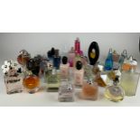 A COLLECTION OF PARTIALLY USED DESIGNER PERFUME BOTTLES, to include Giorgio Armani, Guerlain and