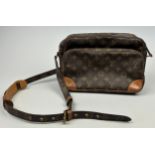 A LOUIS VUITTON CROSSBODY MESSENGER BAG, brown leather with Louis Vuitton monogram emblem throughout