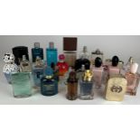 A COLLECTION OF PARTIALLY USED DESIGNER PERFUME BOTTLES to include Dolce and Gabbana and Gucci (Qty)