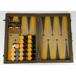 AN ART DECO BACKGAMMON SET, cased 72cm x 54cm when open