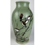 A JAPANESE MEIJI PERIOD (1868-1912) GREEN GLAZED BALUSTER VASE, painted and enamelled with