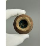 AN ANCIENT EGYPTIAN FUNERARY VESSEL FILLED WITH BLUE FAIENCE BEADS AND MUMMY CLOTH Old Sussex