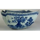 A LARGE CHINESE PORCELAIN 18TH CENTURY BLUE AND WHITE BOWL, Painted with imagery of flowers in a