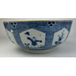 A LARGE 18TH CENTURY CHINESE PORCELAIN BOWL, Blue and white painted depicting a boy at play. Various