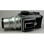 A 1981 HASSELBLAD 500 C/M Camera with SONNAR 150 mm Lens and A.12 back. Full working order and in