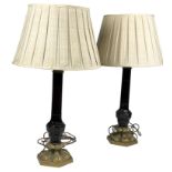 A PAIR OF EMPIRE DESIGN RED GLASS TABLE LAMPS, mounted on heavy brass bases with shades
