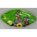 A GREEN LUSTRE CARLTON WARE 'HOLLYHOCKS' DESIGN OVAL DISH 27cm width