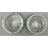 A PAIR OF LALIQUE CRYSTAL 'CONCARNEAU' ASHTRAYS, DEPICTING SWIRLING FISH WITH BUBBLES, both signed