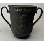A LARGE ROYAL DOULTON LIMITED EDITION COMMEMORATIVE LOVING CUP, Numbered model 219/500. Repair to