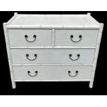 AN OKA FAUX BAMBOO AND RATTAN CHEST IN WHITE, Two short over two long drawers with faux bamboo