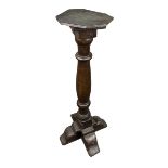 A TORCHERE MADE FROM A LEG OF AN 18TH CENTURY REFECTORY TABLE 87cm in height
