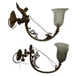 TWO ART NOUVEAU BRASS WALL SCONCES WITH WINGED CHERUBS AND GIRLS HOLDING REINS, each with opaque