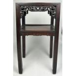 AN EARLY 19TH CENTURY CHINESE ROSEWOOD TWO TIER TABLE, with intricate fretwork raised on four