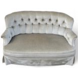 A VICTORIAN BUTTON BACK TWO SEATER SOFA, upholstered in neutral fabric