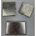 THREE SILVER CIGARETTE CASES, including one larger engine turned by Goldsmiths and Silversmiths