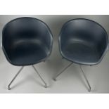 A PAIR OF BLUE DANISH SWIVEL CHAIRS, Each on chrome supports.