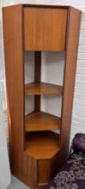 A G-PLAN TEAK CORNER CABINET, Three shelves and top opening cupboard. 198cm H