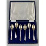 A SILVER AND GILT SPOON PRESENTATION SET IN A CASE (6) Marks for Roberts and Belks Weight 100gms