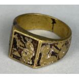 A GOLD RING DECORATED WITH HORSES, initials engraved within