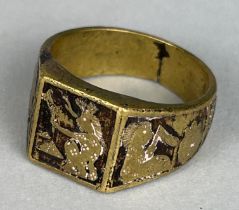 A GOLD RING DECORATED WITH HORSES, initials engraved within