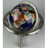 A CHROME AND GLASS DESK GLOBE, with hardstone and mother of pearl inserts