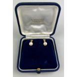 A PAIR OF GOLD AND PEARL EARRINGS, Housed within a blue velvet case. Total weight 3.5gms 1.5mm