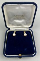 A PAIR OF GOLD AND PEARL EARRINGS, Housed within a blue velvet case. Total weight 3.5gms 1.5mm