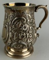 A LATE GEORGIAN REPOUSSE SILVER JUG, Dated 1835 weight 180gms 10cm H